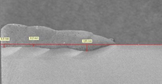 Cross-section of welded hardfacing layer